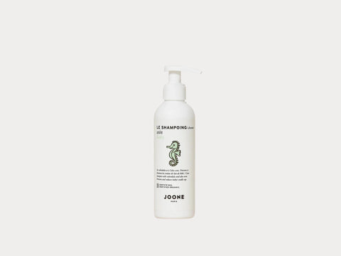 Shampooing croûte de lait Joone 200ml, flacon blanc avec étiquette, conçu pour nettoyer en douceur la peau sensible du bébé.