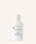 Eau nettoyante Minois Paris pour visage et corps, nettoyage sans rinçage, flacon transparent avec logo blanc.