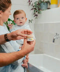 Baume visage bébé bio Pototam pour peau sèche et sensible, contenant crème nourrissante pour visage et corps de bébé.