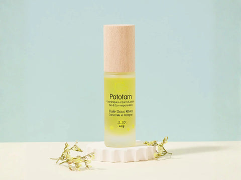 Huile Doux Rêves Camomille et Petitgrain de Pototam, massage visage et corps, flacon avec étiquette et pompe.