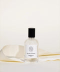 Parfum EAU DE TOILETTE Sérénité & Détente d'Enfance Paris, flacon élégant avec étiquette parfumée en verre.